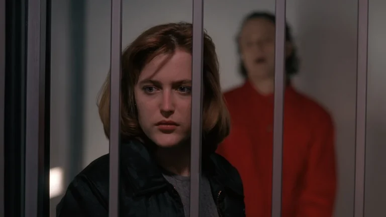 Dana Scully is watched by Luther Lee Boggs